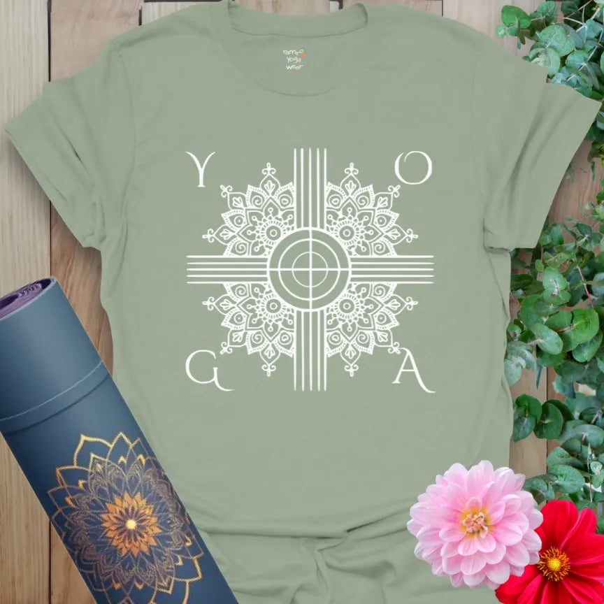 Calm sage green yoga t-shirt with mandala-inspired art representing equilibrium, strength, and mindfulness.