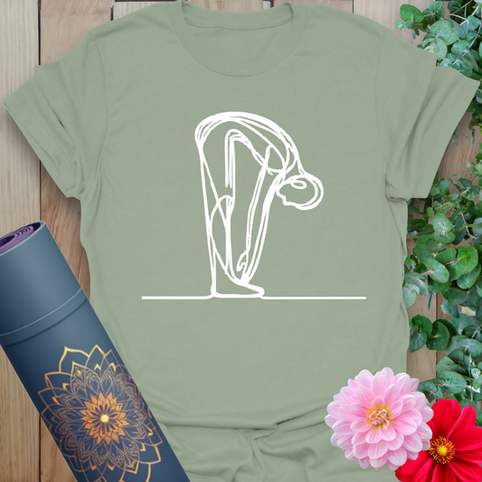 Calm sage green yoga t-shirt featuring line art forward bend pose for grounded mindfulness and soulful movement.