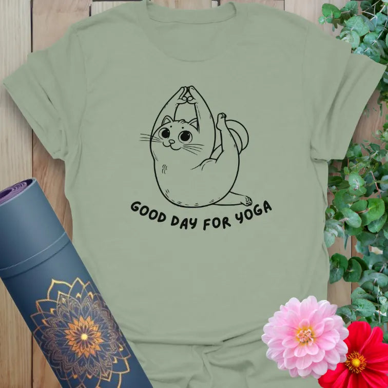 Calm sage green yoga t-shirt featuring yoga cat artwork and positive mindful living quote for conscious, joyful movement.