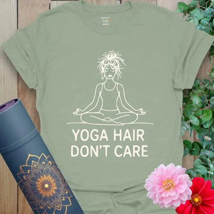Sage Hair T-Shirt with minimalist white outline of yogi in meditation pose, messy hair, and fun slogan “Yoga Hair Don’t Care.” Soft cotton tee.