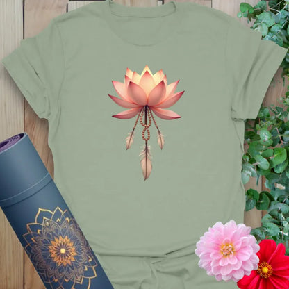 Calm sage green yoga t-shirt featuring serene lotus and feather illustration for peaceful, mindful movement.