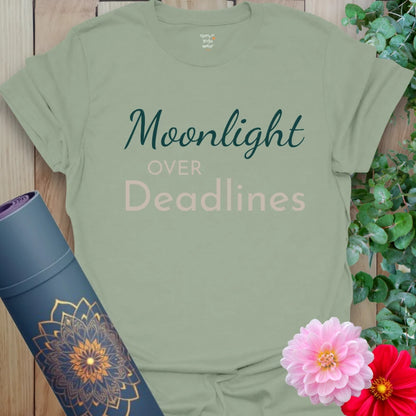 Sage green Moonlight T-Shirt featuring soft, earthy script. Ideal for grounded living and intuitive days.