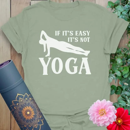 Calm sage green yoga t-shirt featuring funny yoga affirmation inspiring strength, resilience, and heart-centered living.