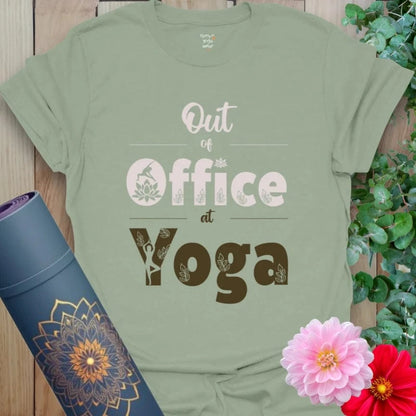 Sage Out Of Office T-Shirt with calming green hues and yoga shapes inside letters. Perfect for nature walks, breathwork breaks, and weekend flow.