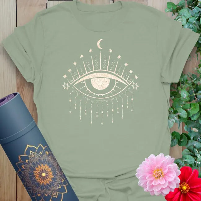 Sage green yoga t-shirt featuring mystical third eye artwork with celestial elements for spiritual alignment and intuition.