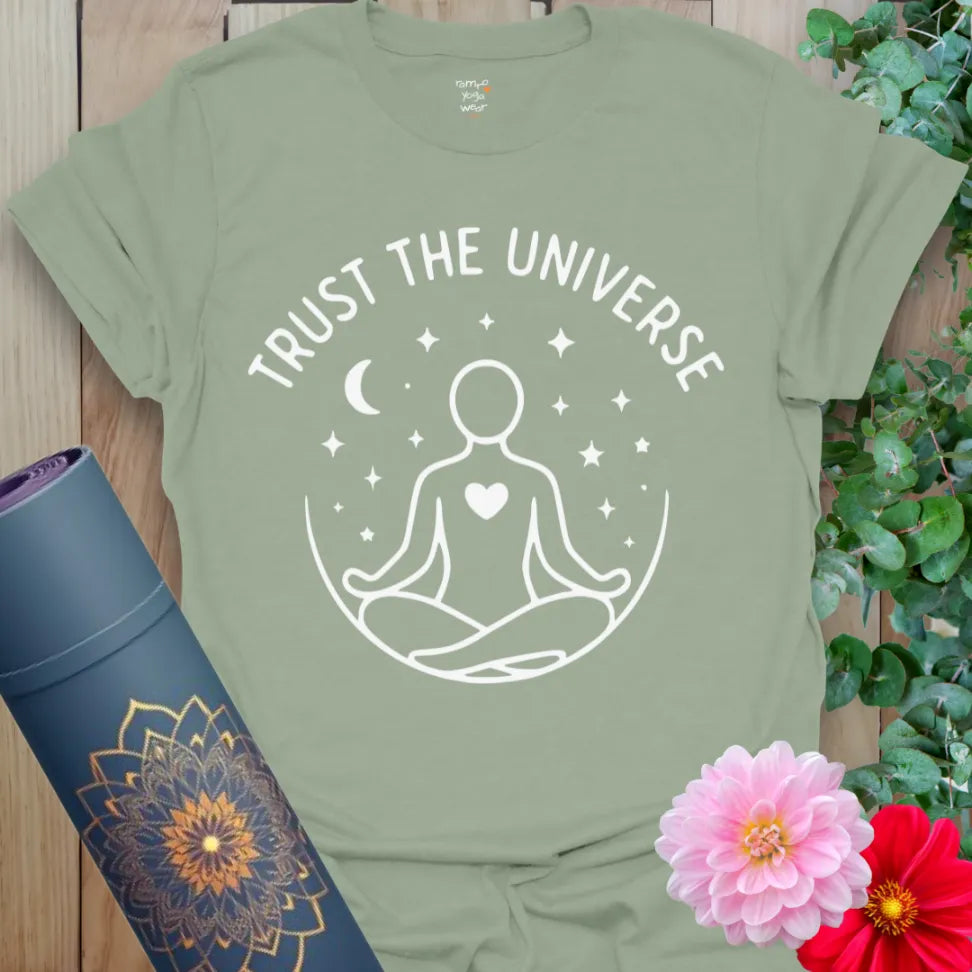 Sage green yoga tee with heart-centered meditation graphic and starlit message encouraging trust and alignment.