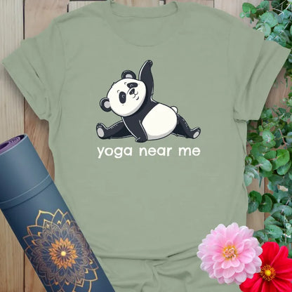 Calm sage green yoga t-shirt with panda stretching pose and funny yoga slogan for relaxed movement.