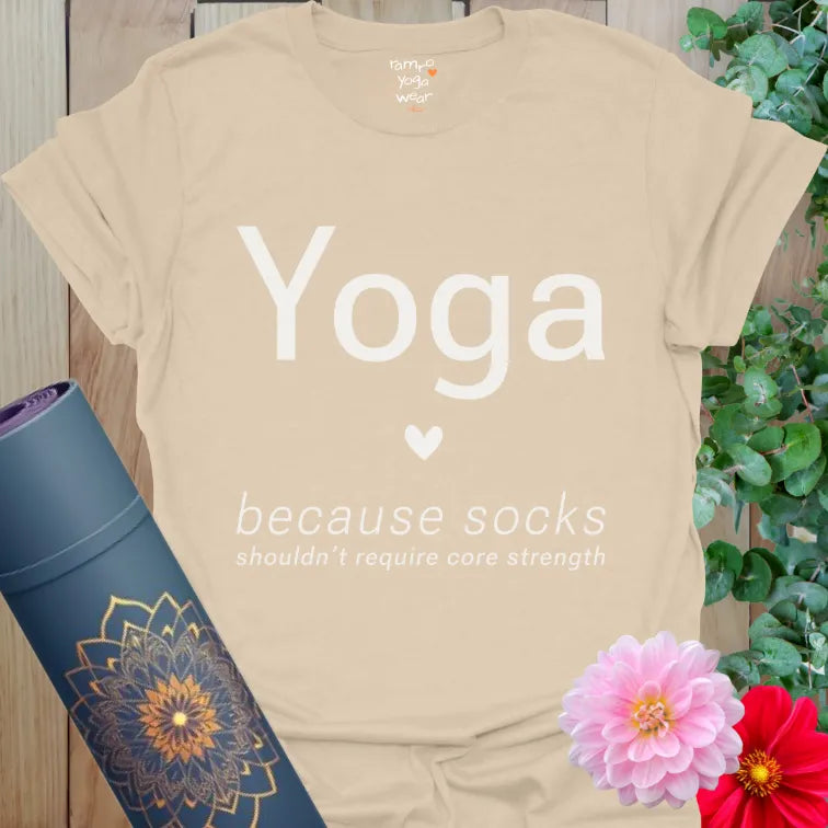Sand Socks T-Shirt with “Yoga” text, heart icon, and the phrase “because socks shouldn’t require core strength.”