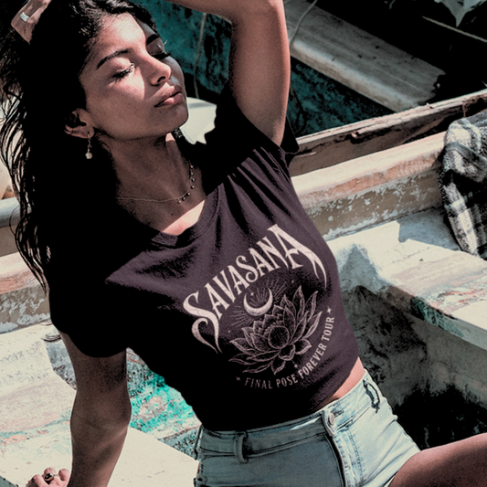 Ramro Yoga Wear Savasana tee in Black — gothic lotus and crescent moon design, coastal boat lifestyle shot