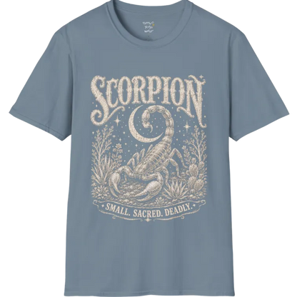 A short sleeved tee with the illustration of a Scorpion beneath a crescent moon with desert botanicals, "Small. Sacred. Deadly." banner design — Wild Animals collection by Ramro Yoga Wear in Stone Blue.