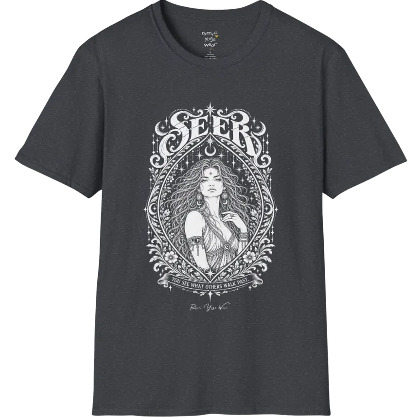 A short sleeved tee called the Seer T-Shirt, flat lay and a soft cotton blend shirt. Simply says, You see what others walk past. Design highlights an ornate engraved almond-shaped frame of florals and filigree around a close portrait of a long-haired figure with a star on the brow, crescent moon earrings and one hand at the collarbone, beneath a crescent moon and hanging stars, with Seer in decorative lettering across the top and the tagline on a banner below. Color is Dark Heather Grey.