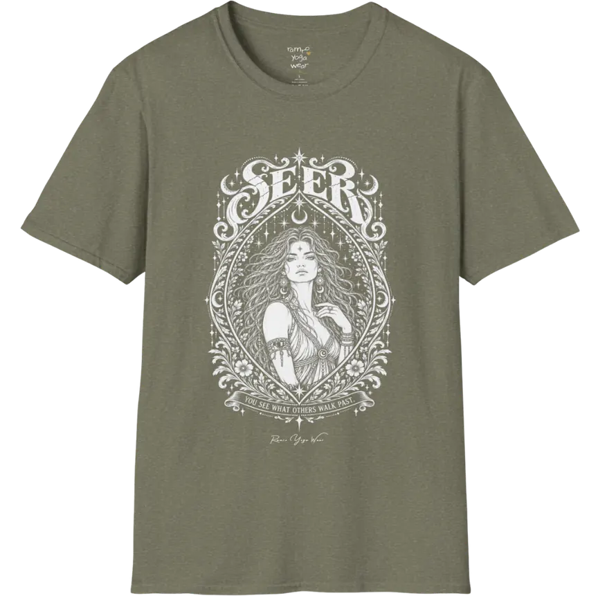 A short sleeved tee called the Seer T-Shirt, flat lay and a soft cotton blend shirt. Simply says, You see what others walk past. Design highlights an ornate engraved almond-shaped frame of florals and filigree around a close portrait of a long-haired figure with a star on the brow, crescent moon earrings and one hand at the collarbone, beneath a crescent moon and hanging stars, with Seer in decorative lettering across the top and the tagline on a banner below. Color is Heather Military Green.