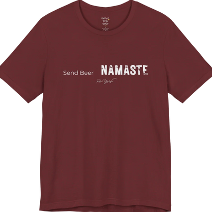 "Send Beer" in small script, followed by a  bold "NAMASTE" lettering. Send Beer T-Shirt flat lay is a Bella+Canvas 3001 and the color is Heather Cardinal.