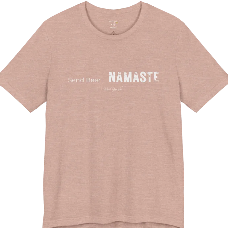 "Send Beer" in small script, followed by a  bold "NAMASTE" lettering. Send Beer T-Shirt flat lay is a Bella+Canvas 3001 and the color is Heather Prism Peach.