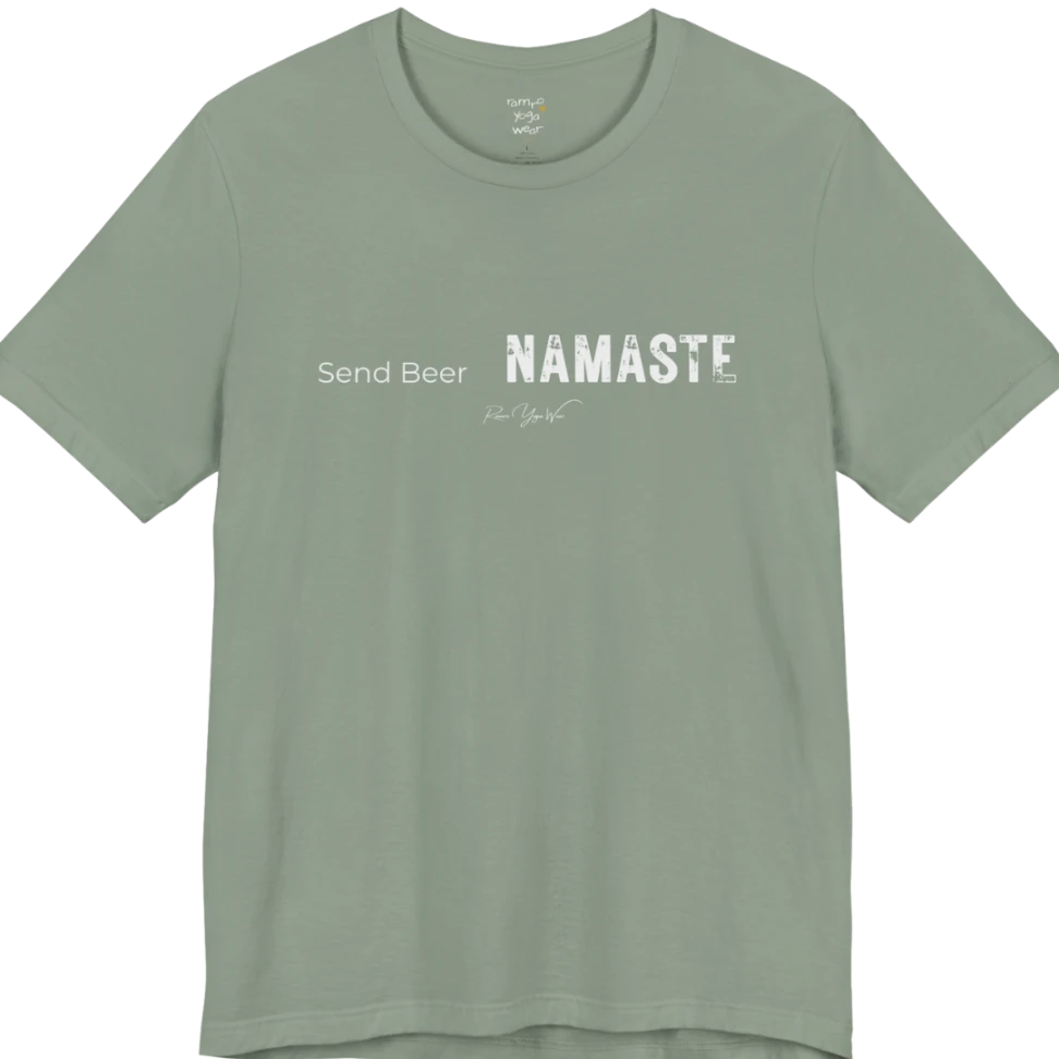 "Send Beer" in small script, followed by a  bold "NAMASTE" lettering. Send Beer T-Shirt flat lay is a Bella+Canvas 3001 and the color is Sage.