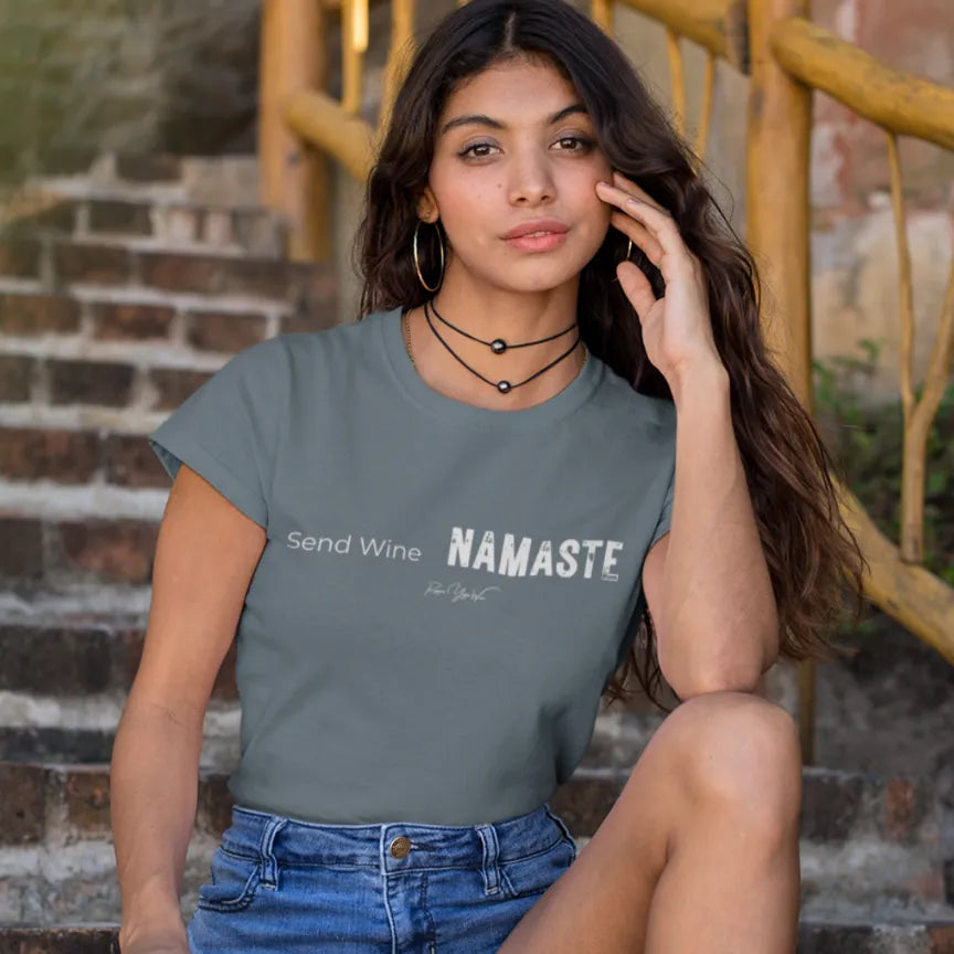 Woman wearing Send Wine T-Shirt outdoors, hand near her face, shirt in Heather Slate