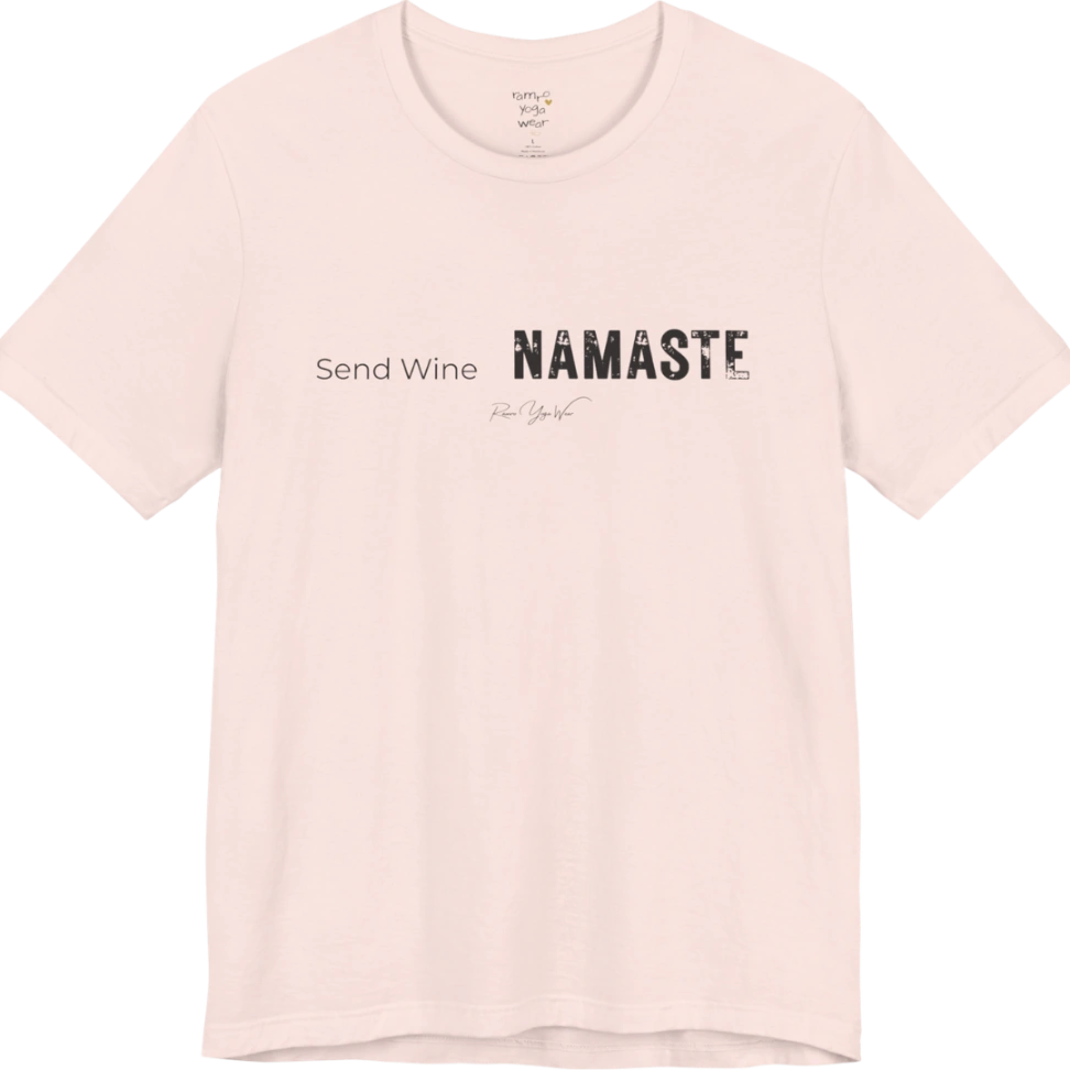 Send Wine T-Shirt flat lay — "Send Wine Namaste" typographic graphic tee by Ramro Yoga Wear in Soft Pink