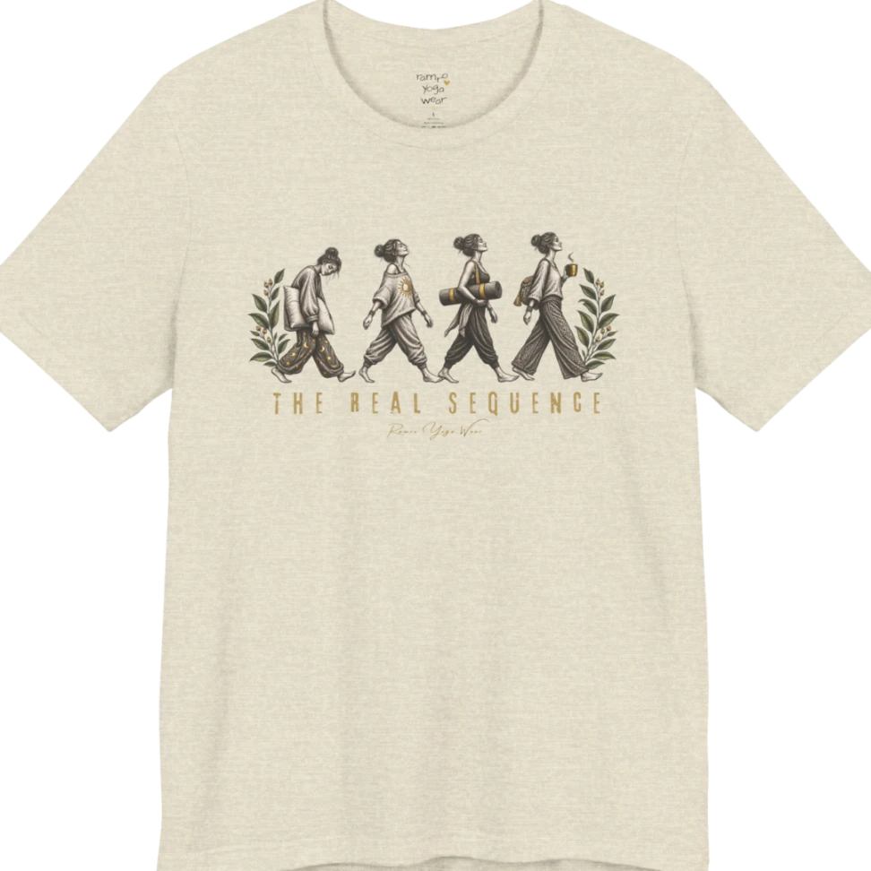 Four illustrated figures walking in sequence — pillow, sunburst top, rolled yoga mat, and coffee cup — framed by botanical leaf sprigs. Sequence T-Shirt flat lay is a Bella+Canvas 3001 and the color is Heather Prism Natural.