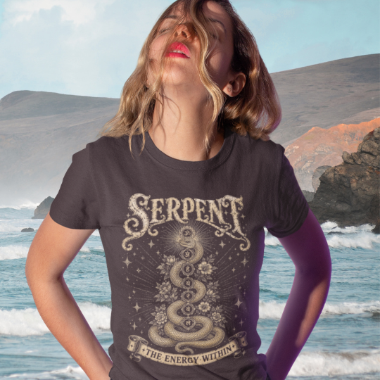 Ramro Yoga Wear Serpent tee in Dark Chocolate — the energy within kundalini serpent design, coastal ocean rocks lifestyle shot