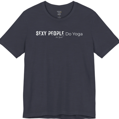 A short sleeved tee called the Sexy T-Shirt, flat lay and a soft cotton shirt. Simply says, Sexy People Do Yoga. Design highlights bold distressed block lettering for Sexy People beside lighter thin lettering for Do Yoga, with a small script signature underneath. Color is Heather Midnight Navy.