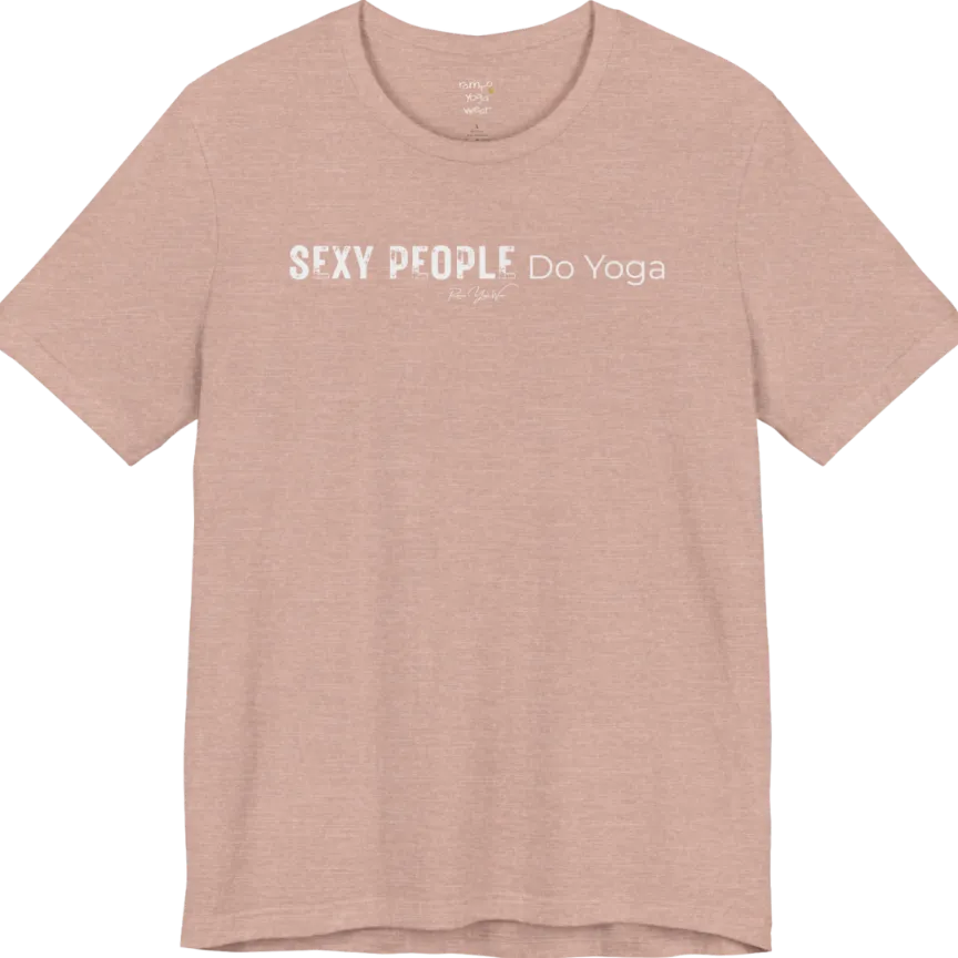 A short sleeved tee called the Sexy T-Shirt, flat lay and a soft cotton shirt. Simply says, Sexy People Do Yoga. Design highlights bold distressed block lettering for Sexy People beside lighter thin lettering for Do Yoga, with a small script signature underneath. Color is Heather Prism Peach.