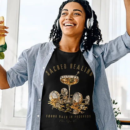 Person wearing the Sound Bath T-Shirt in Black, arms raised with headphones on — Funny Yoga Shirts collection by Ramro Yoga Wear.