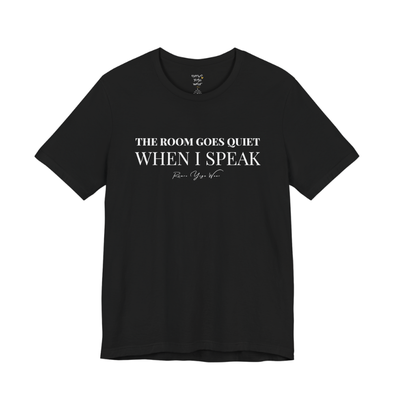THE ROOM GOES QUIET WHEN I SPEAK yoga teacher gift tee flat lay in Black — Yoga Teacher Gifts collection by Ramro Yoga Wear