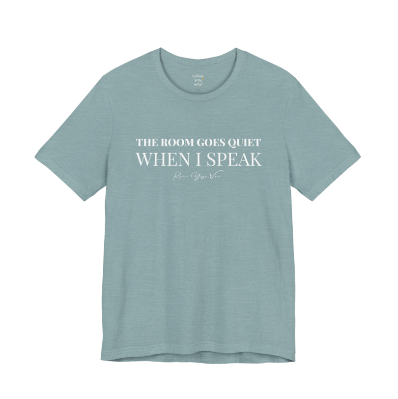THE ROOM GOES QUIET WHEN I SPEAK yoga teacher gift tee flat lay in Heather Blue Lagoon — Yoga Teacher Gifts collection by Ramro Yoga Wear