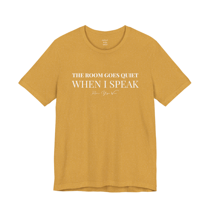 THE ROOM GOES QUIET WHEN I SPEAK yoga teacher gift tee flat lay in Heather Mustard — Yoga Teacher Gifts collection by Ramro Yoga Wear