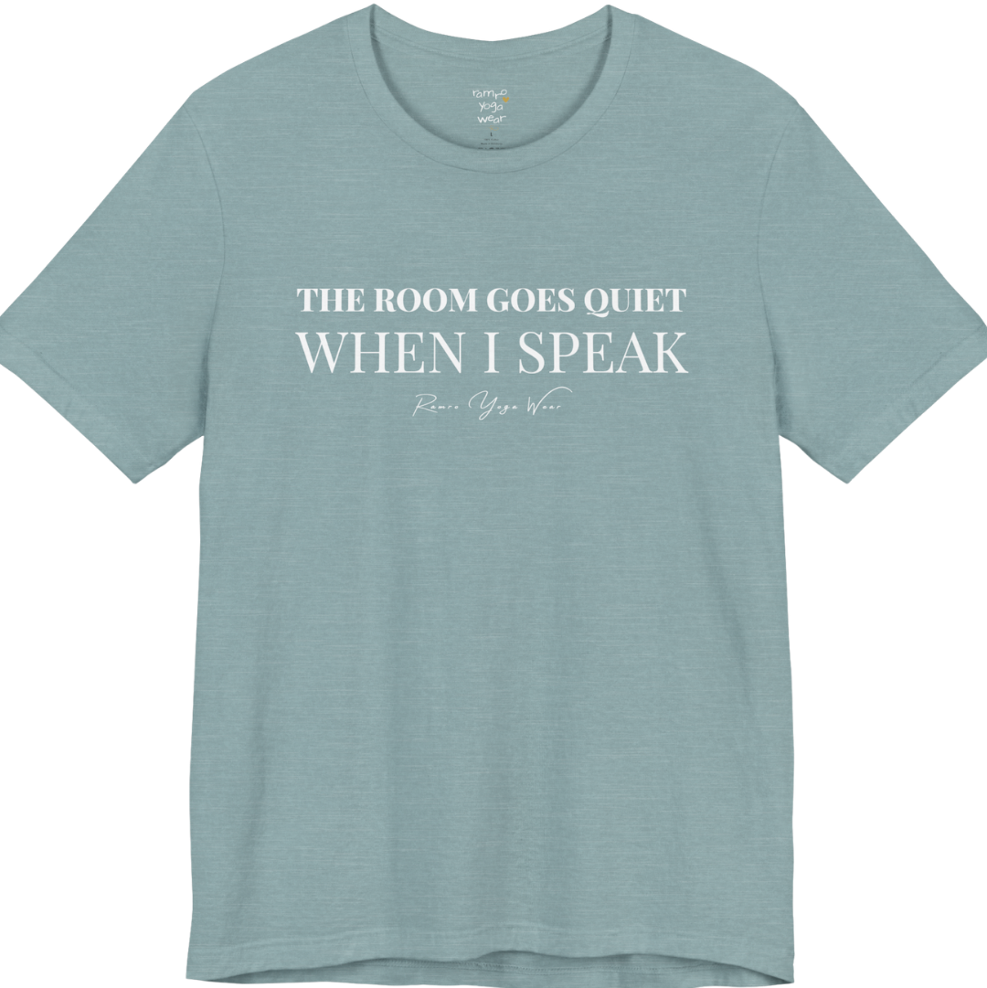 THE ROOM GOES QUIET WHEN I SPEAK yoga teacher gift tee flat lay in Heather Blue Lagoon — Yoga Teacher Gifts collection by Ramro Yoga Wear