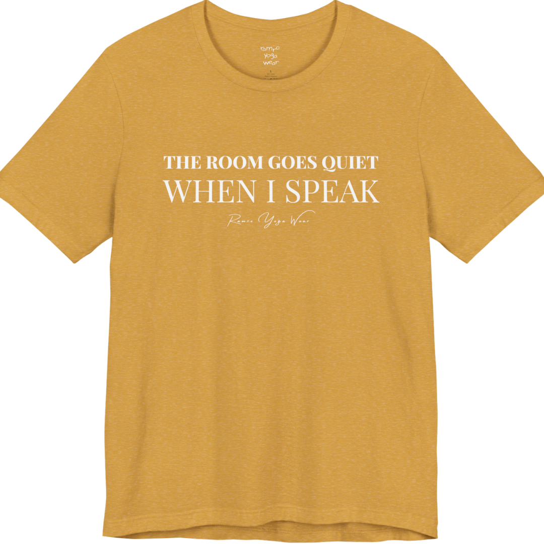 THE ROOM GOES QUIET WHEN I SPEAK yoga teacher gift tee flat lay in Heather Mustard — Yoga Teacher Gifts collection by Ramro Yoga Wear