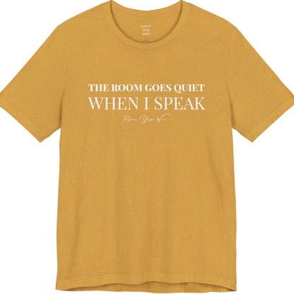 THE ROOM GOES QUIET WHEN I SPEAK yoga teacher gift tee flat lay in Heather Mustard — Yoga Teacher Gifts collection by Ramro Yoga Wear