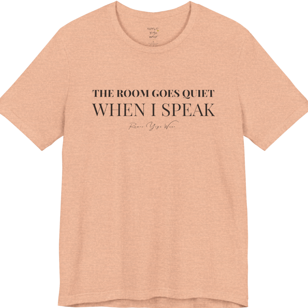 THE ROOM GOES QUIET WHEN I SPEAK yoga teacher gift tee flat lay in Heather Peach — Yoga Teacher Gifts collection by Ramro Yoga Wear