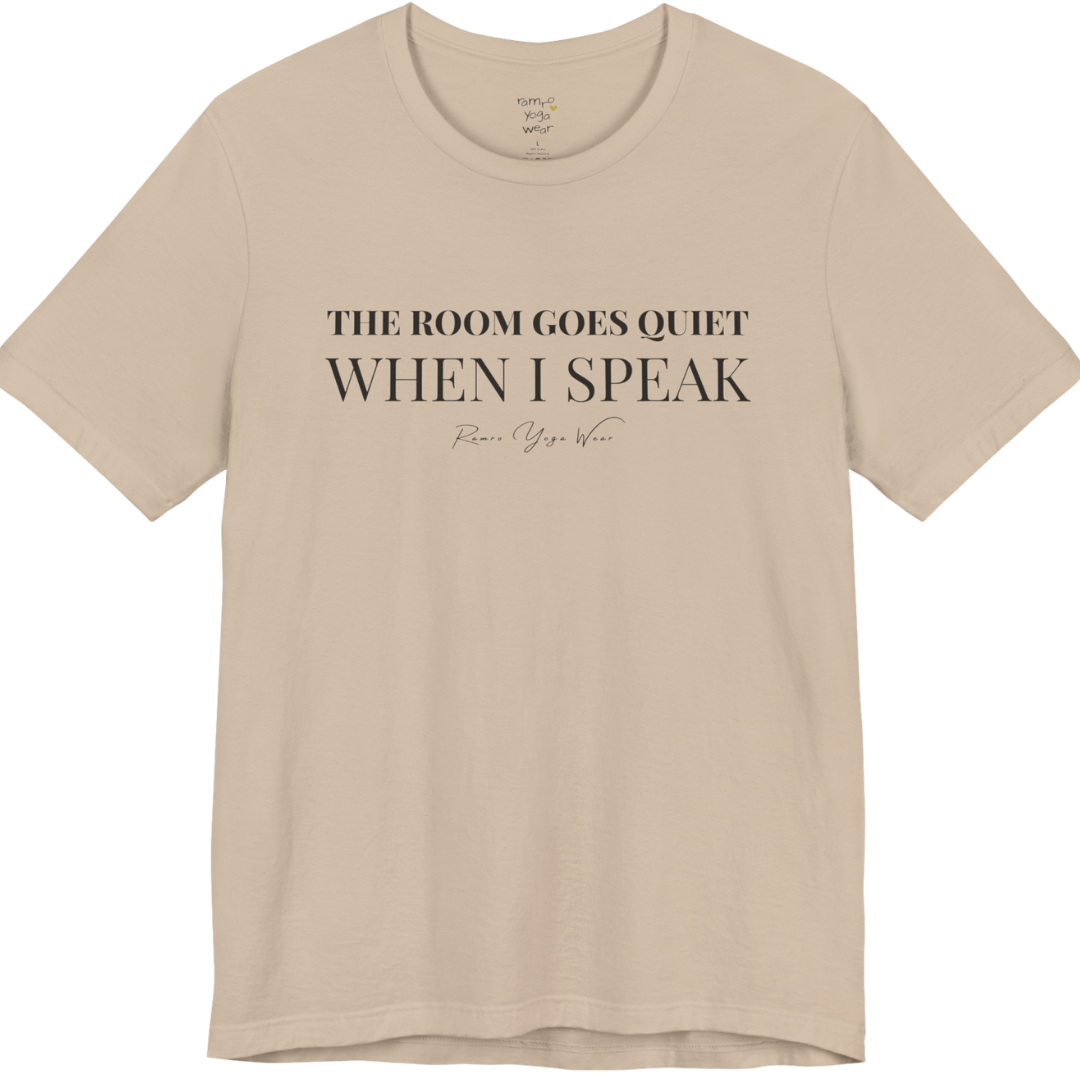 THE ROOM GOES QUIET WHEN I SPEAK yoga teacher gift tee flat lay in Tan — Yoga Teacher Gifts collection by Ramro Yoga Wear