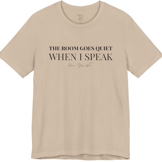 THE ROOM GOES QUIET WHEN I SPEAK yoga teacher gift tee flat lay in Tan — Yoga Teacher Gifts collection by Ramro Yoga Wear