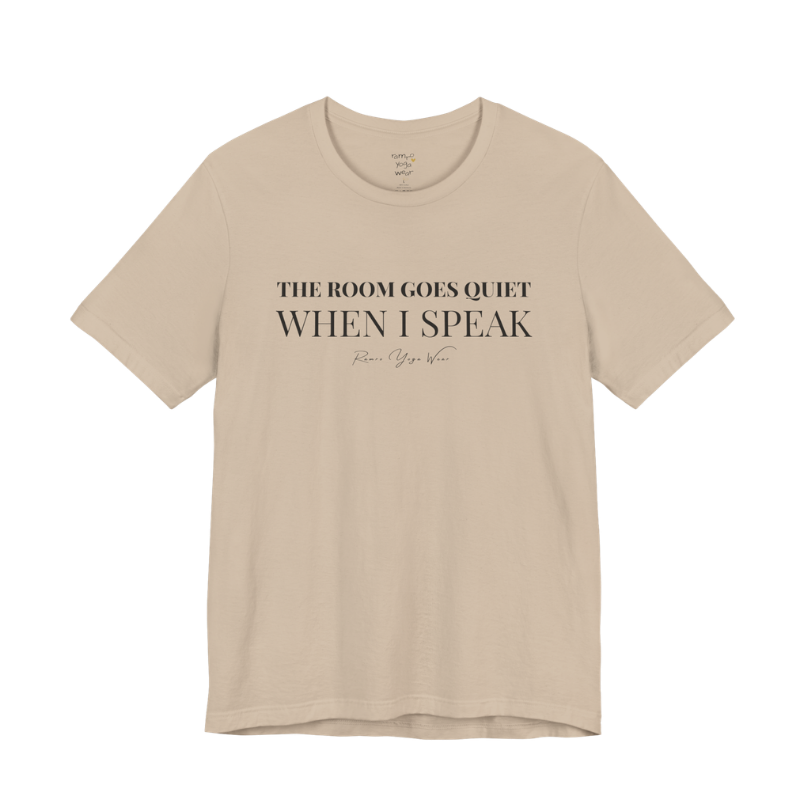 THE ROOM GOES QUIET WHEN I SPEAK yoga teacher gift tee flat lay in Tan — Yoga Teacher Gifts collection by Ramro Yoga Wear