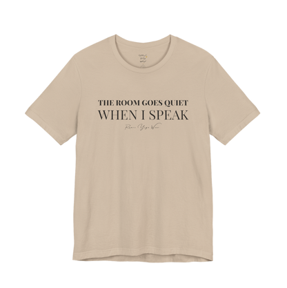 THE ROOM GOES QUIET WHEN I SPEAK yoga teacher gift tee flat lay in Tan — Yoga Teacher Gifts collection by Ramro Yoga Wear