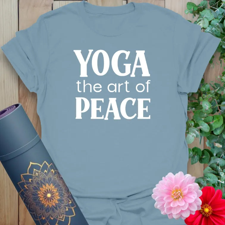 Stone blue yoga shirt featuring "Yoga the art of peace" in bold contrast