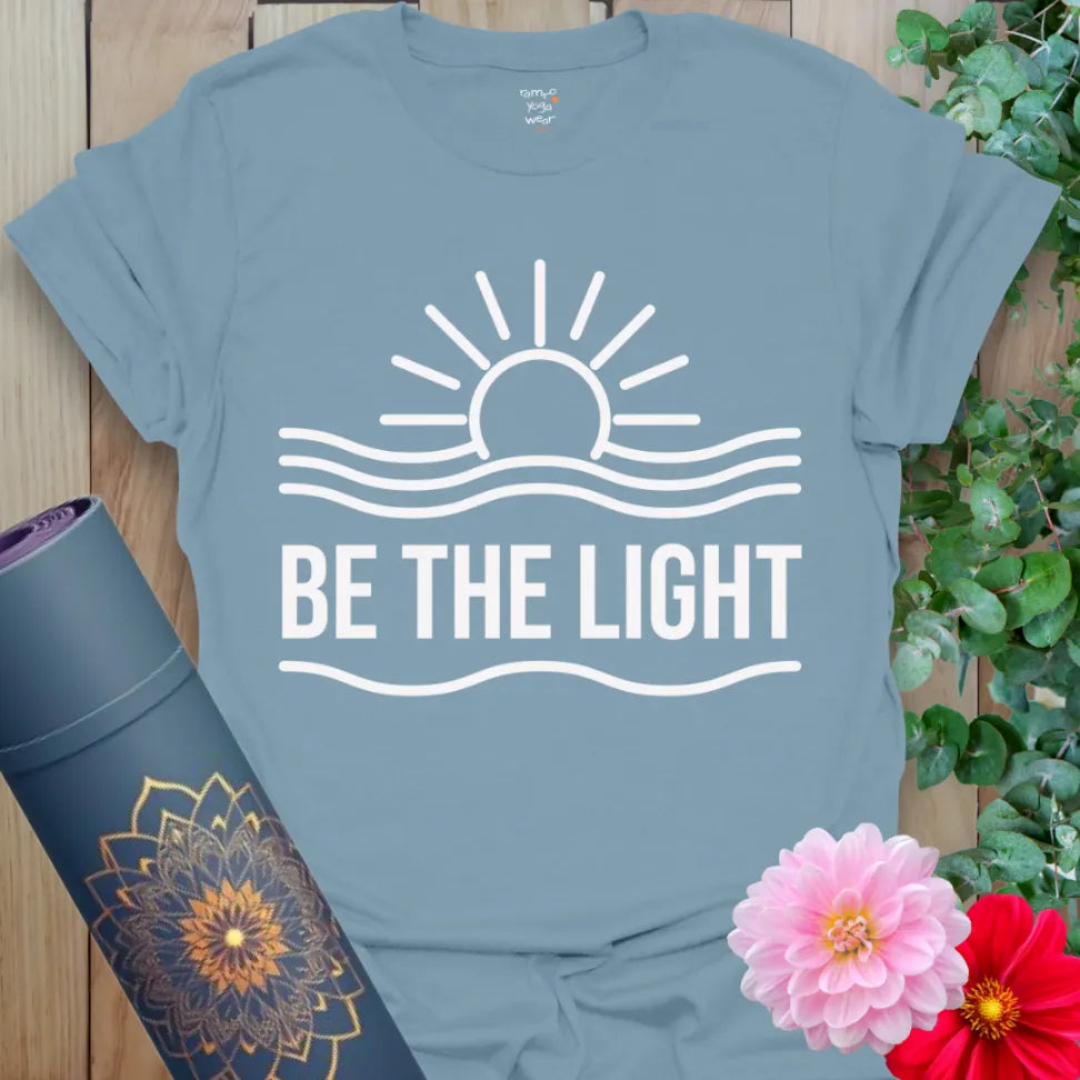Stone blue yoga tee with simple sunrise art and inspiring affirmation