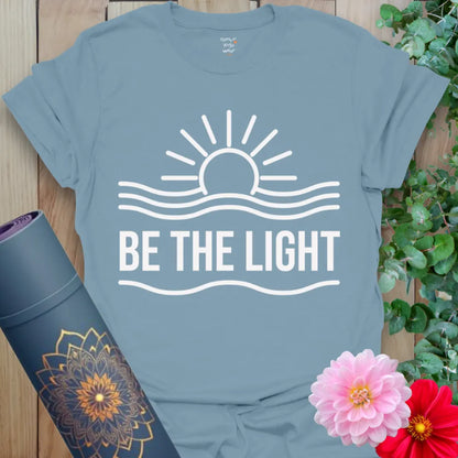 Stone blue yoga tee with simple sunrise art and inspiring affirmation