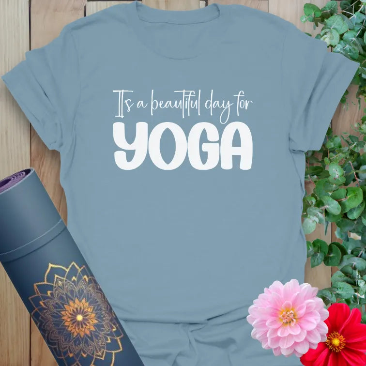 Stone blue yoga tee with “Beautiful day for yoga” affirmation print
