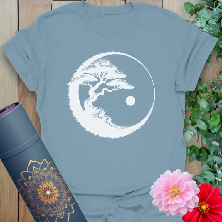 Stone blue yoga t-shirt with centered bonsai and nature harmony design

