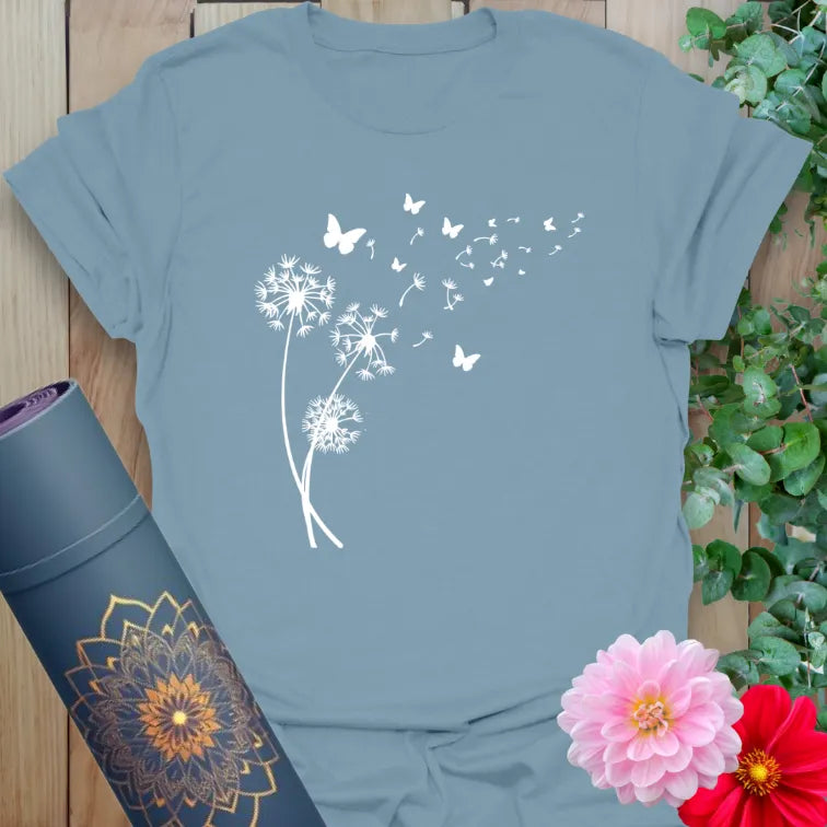 Stone blue Breathe T-Shirt with delicate dandelion design symbolizing mindful breath
