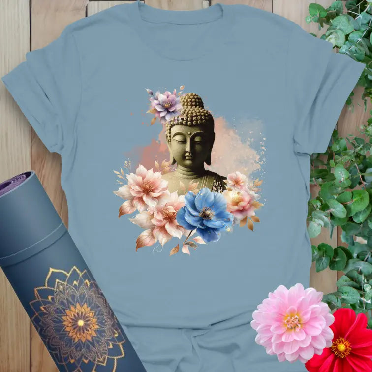 Stone blue t-shirt with serene Buddha image and soft blooming flowers