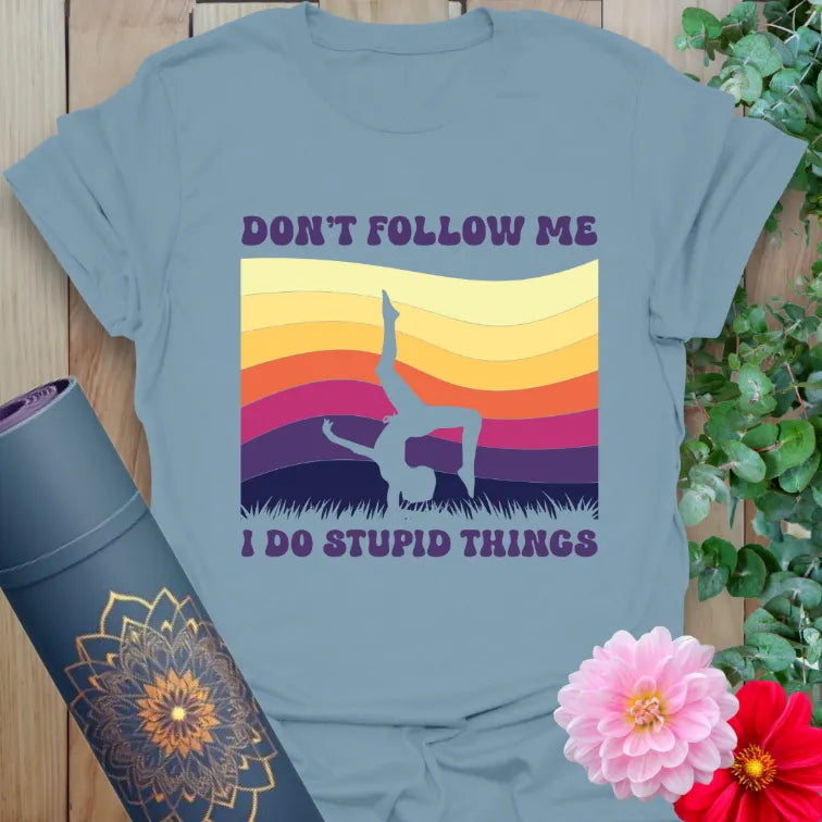 Stone blue Don't Follow T-Shirt with colorful sunset and lighthearted yoga handstand figure
