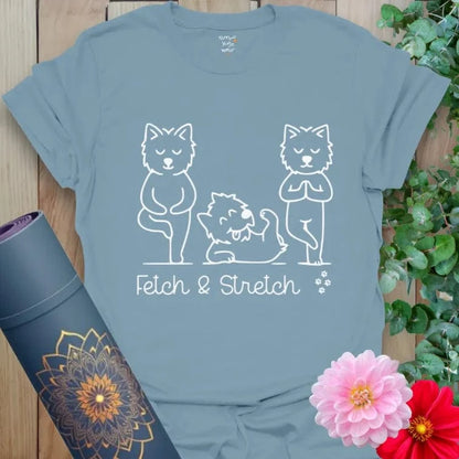 Stone Blue Fetch T-Shirt with three pups in yoga poses. “Fetch & Stretch” playful dog yoga shirt.