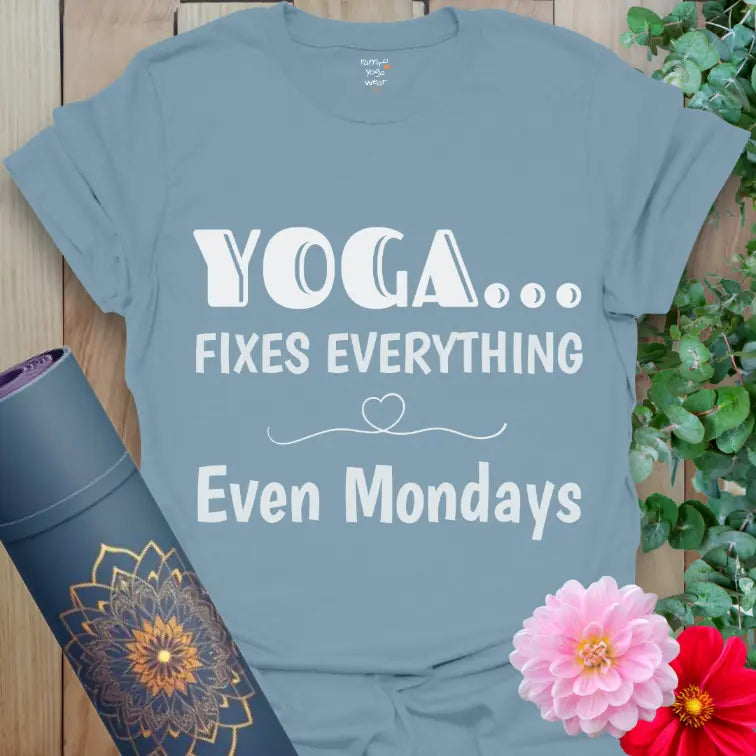 Stone Blue Fixes Everything T-Shirt featuring expressive yoga typography and heart flourish. Easygoing yoga shirt for comfort and balance.