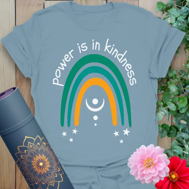 Muted stone blue yoga t-shirt featuring bright rainbow and kindness mantra perfect for soulful, mindful everyday wear.