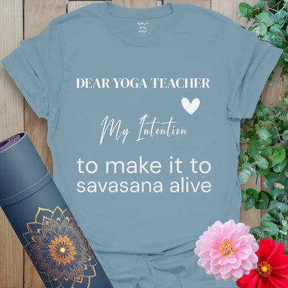 Stone Blue My Intention T-Shirt featuring clean serif text, flowing script, and humorous savasana mantra. Modern yoga lifestyle tee with heart.