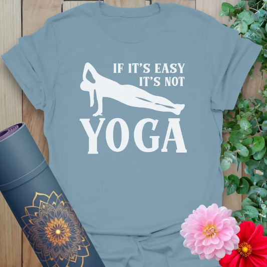 Muted stone blue yoga t-shirt with funny yoga affirmation inspiring resilience, mindful humor, and soulful strength.